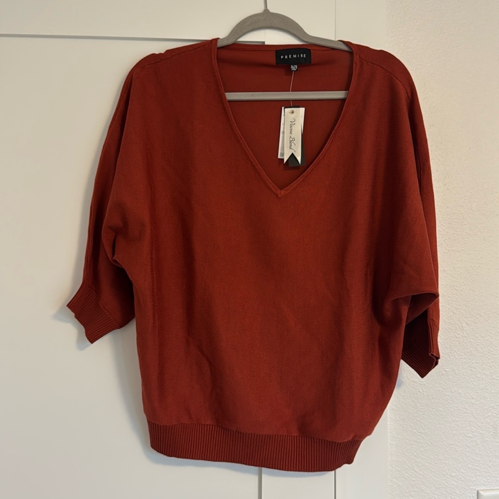 Brand new burnt orange quarter length sweater.